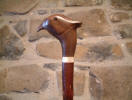 carved pheast in walnut on hazel shank